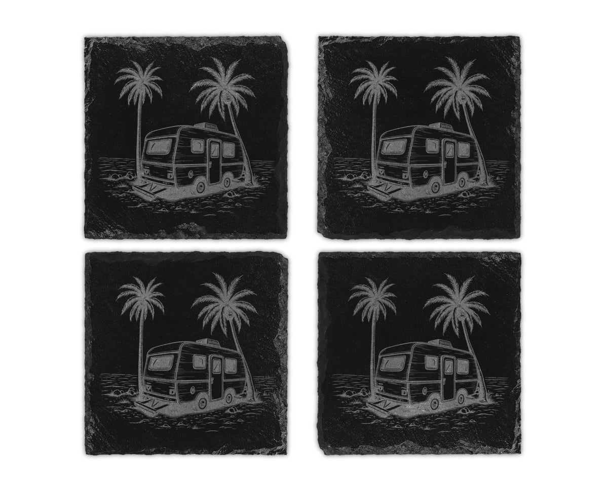 Four black slate coasters etched with a vintage trailer and palm trees on a beach.