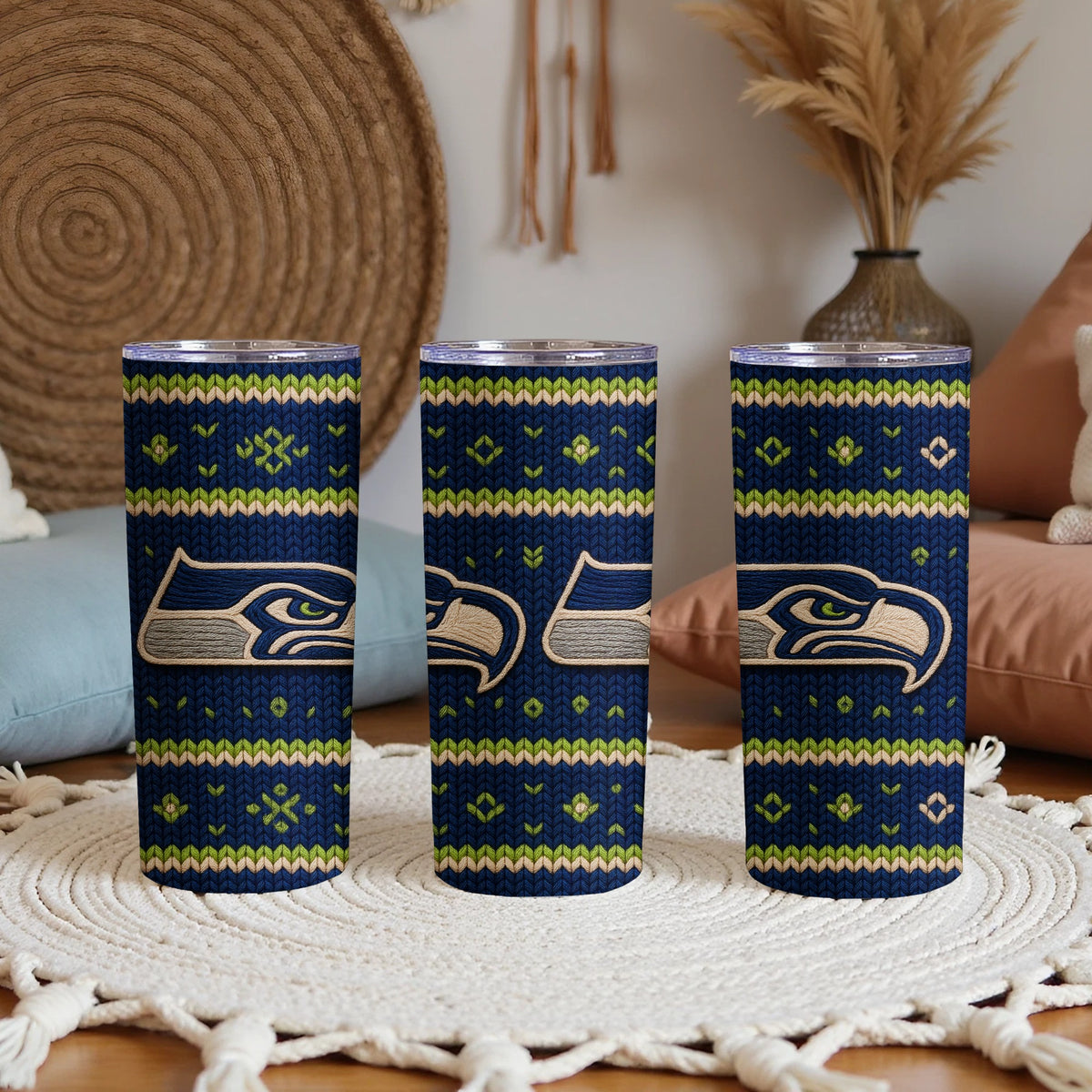Seattle Seahawks tumblers with a navy, green, and beige knit pattern.