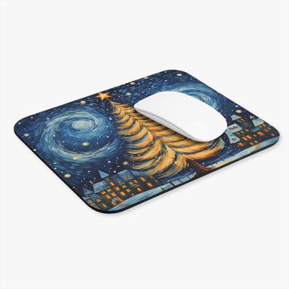 Mousepad with a starry night sky, golden Christmas tree, and a village.