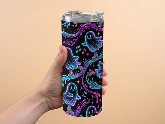 Tumbler with a neon Halloween ghost and bat pattern on a black background.