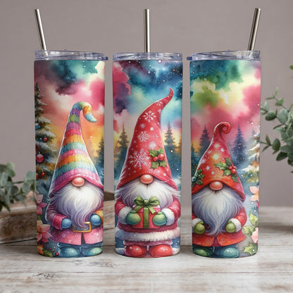 Three watercolor tumblers with gnomes and winter forest scenes.