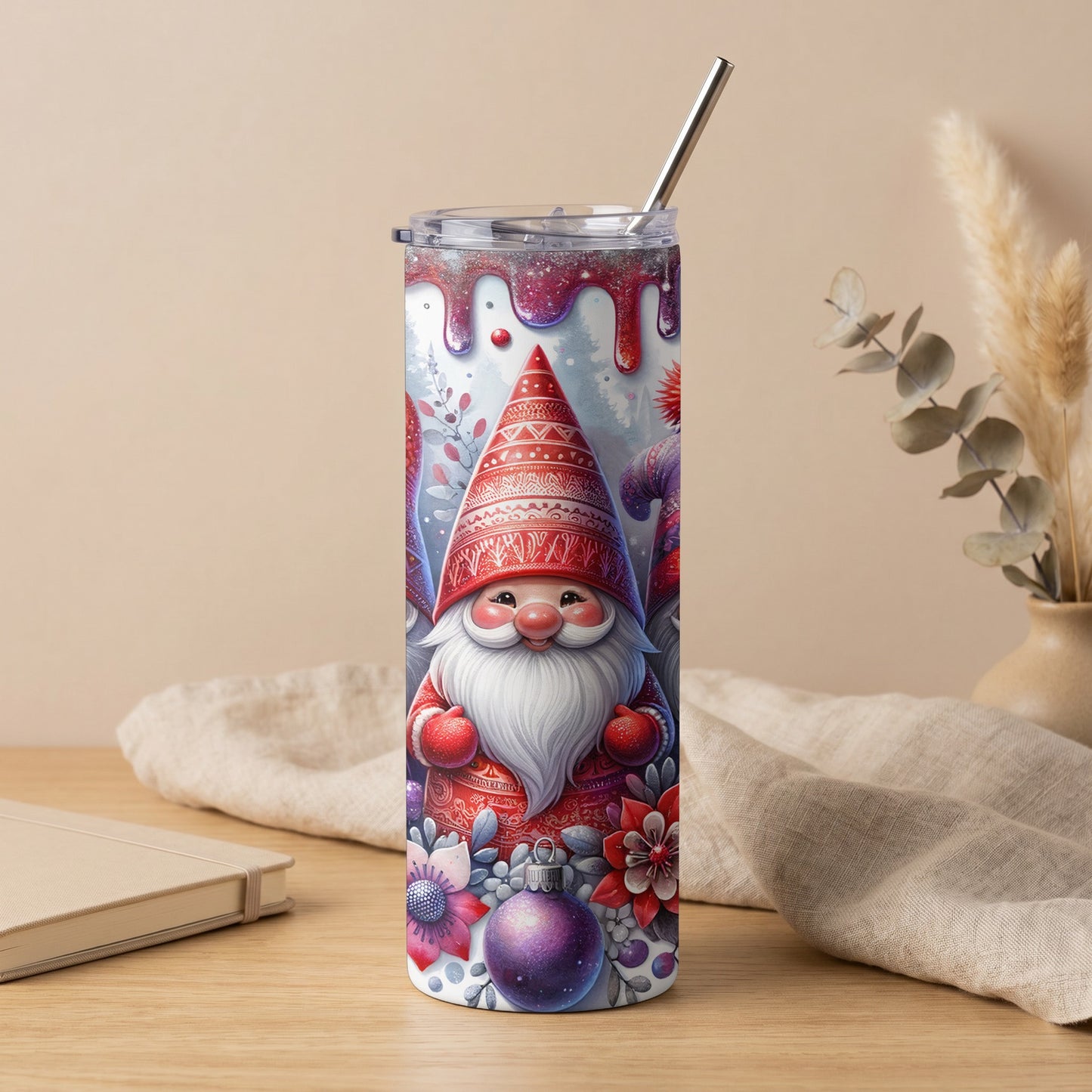 Christmas gnome tumbler with red hat and festive winter floral design.