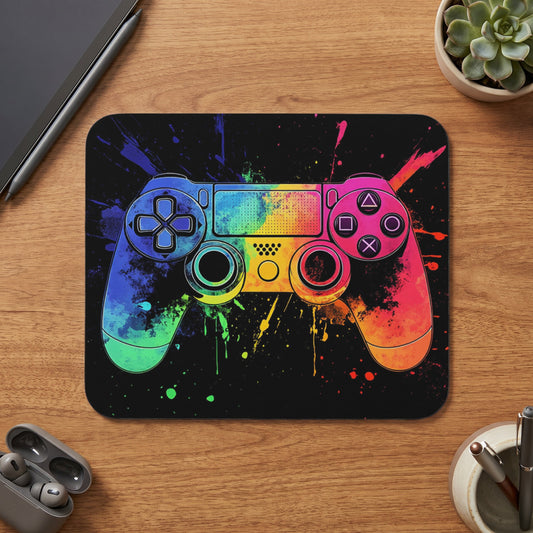 Game controller with colorful paint splatters on a black background.