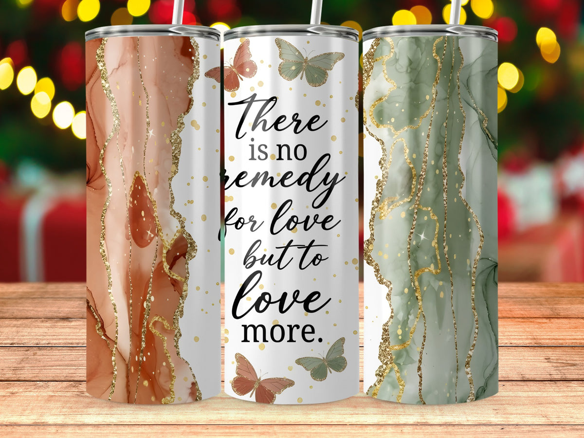 Three tumblers with marble and glitter designs featuring butterflies and the quote "There is no remedy for love but to love more."