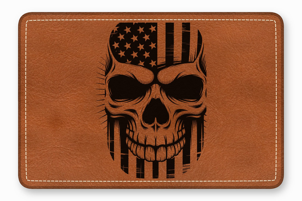 Brown leather patch featuring a black engraved skull graphic combined with the American flag.