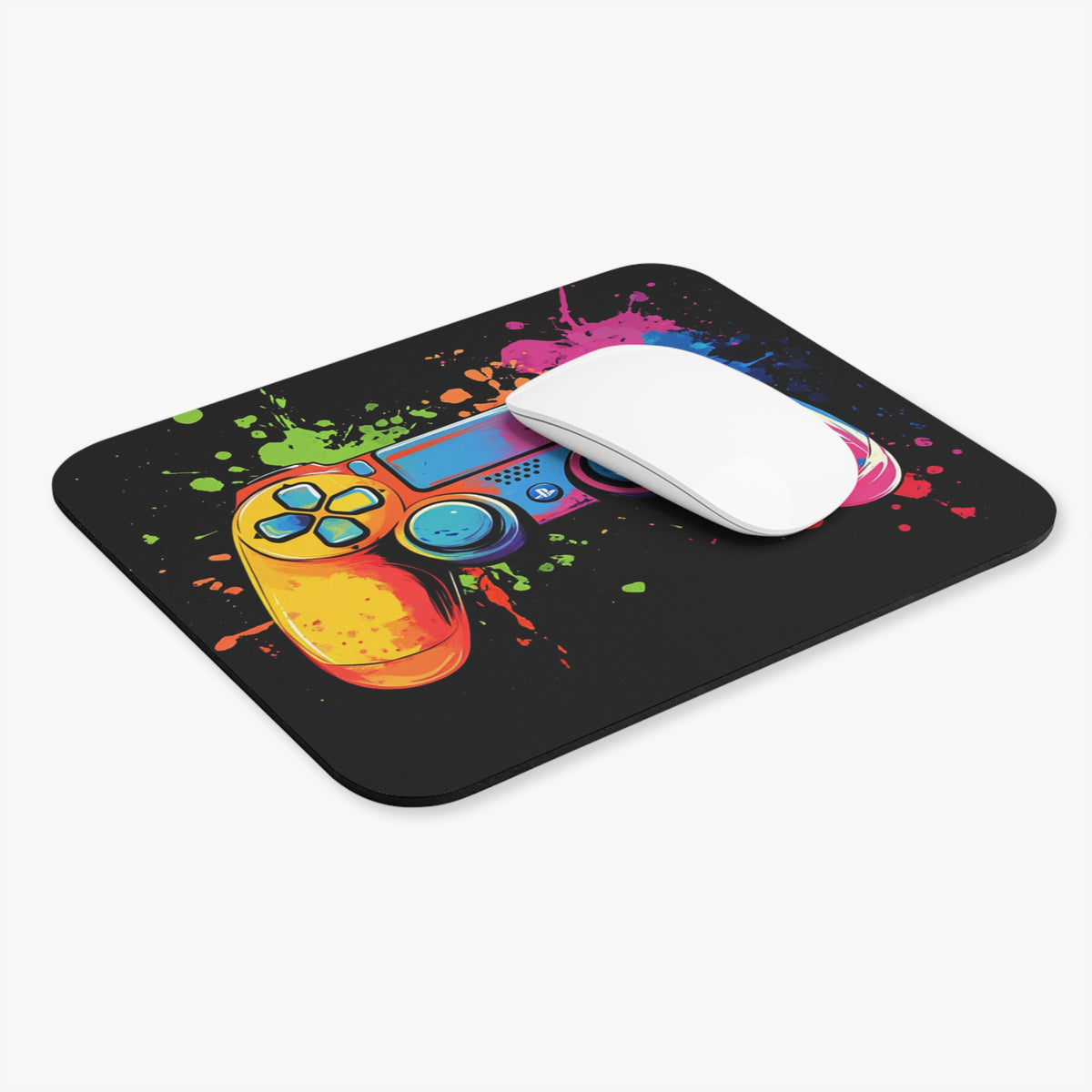 Mousepad with a colorful video game controller and paint splatters design.