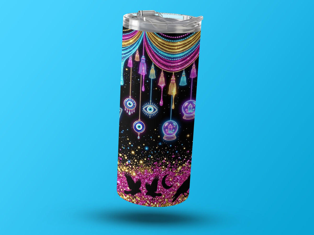 Black tumbler with celestial, evil eye, and crystal ball design on a blue background.