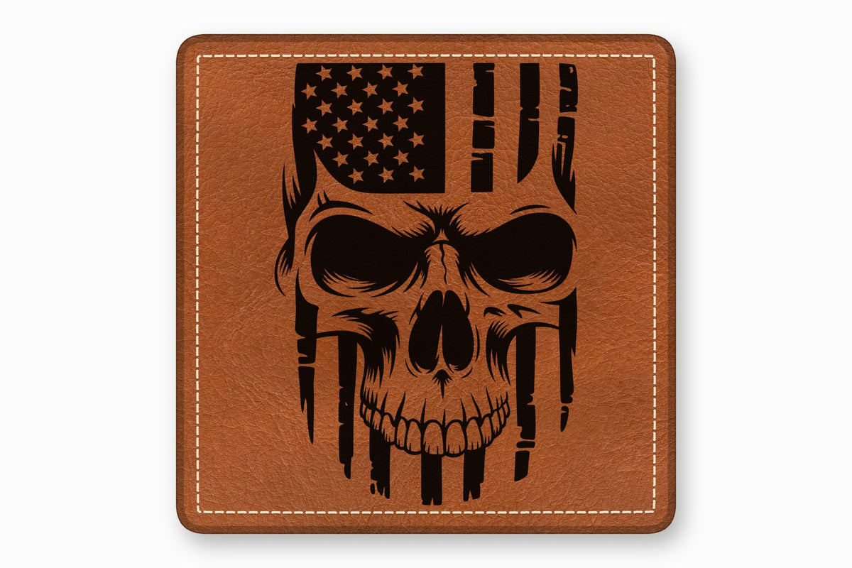 Brown leather square patch with a stitched border and a black laser-engraved American flag skull design.