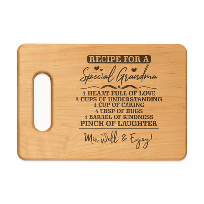 Wooden cutting board with the engraved text "Recipe for a Special Grandma" and ingredients.