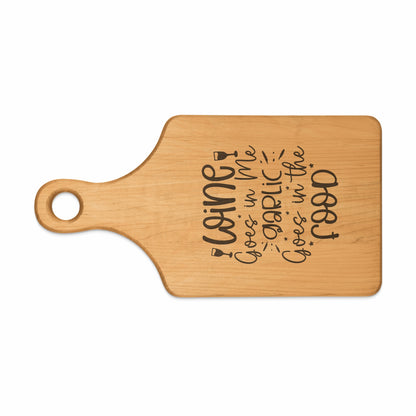Wooden cutting board with "Wine goes in me, garlic goes in the food."