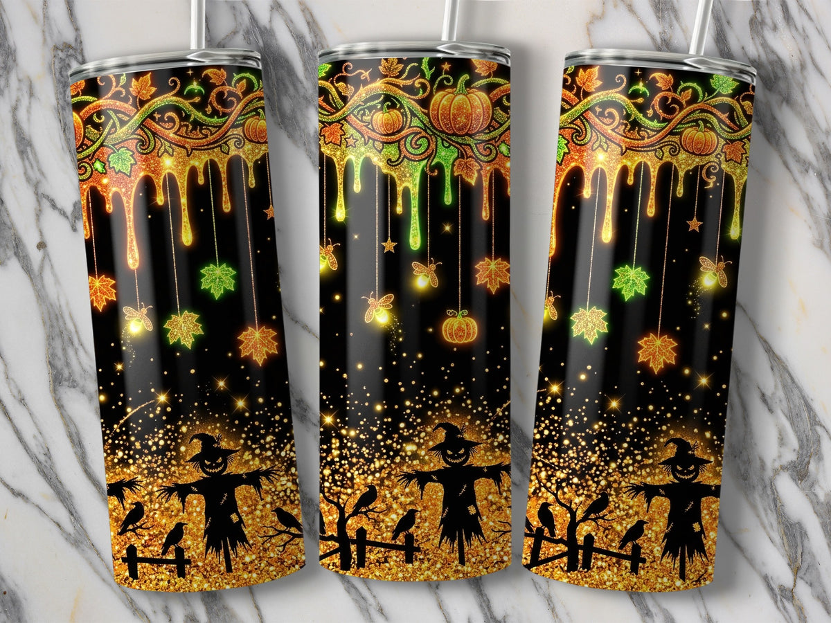 Three tumblers with a glittery black design featuring scarecrows, crows, and autumn leaves.