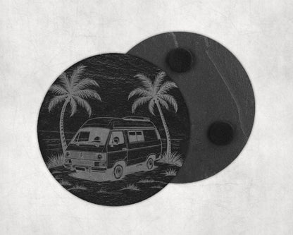 Slate coaster with laser-etched camper van and palm trees on a beach.