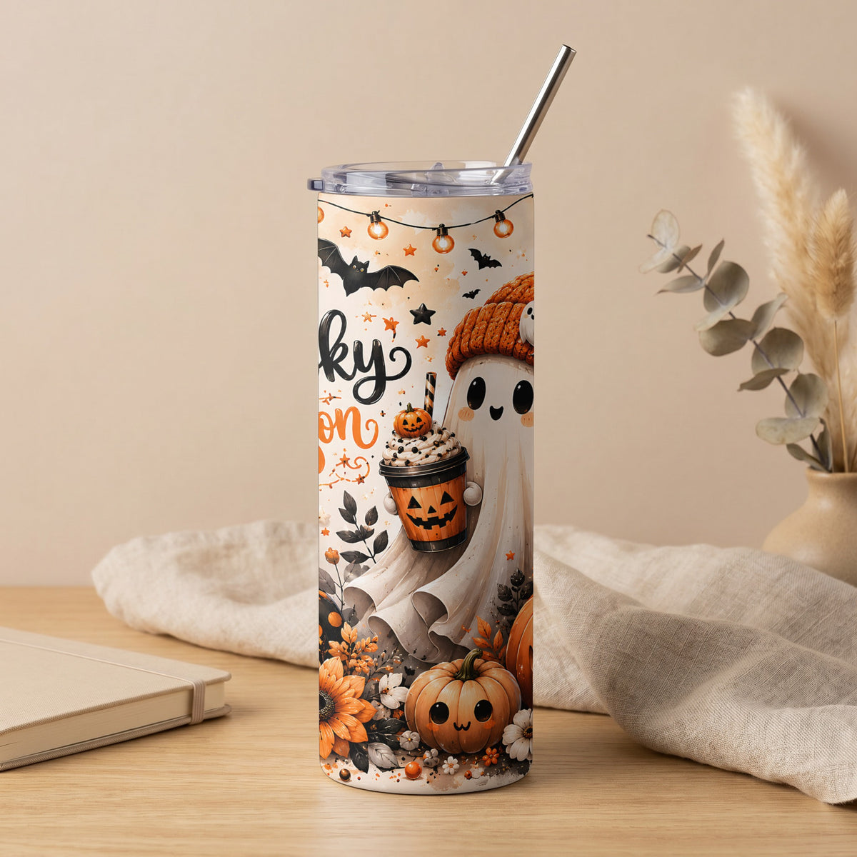 Halloween tumbler with cute ghost, pumpkin, and spooky elements.