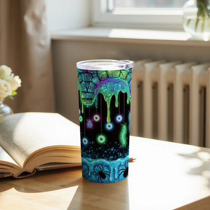 Tumbler with Halloween-themed design of dripping slime, eyeballs, spiders, and bugs.