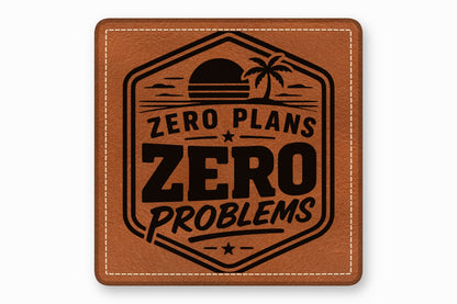 Brown square leather patch with white stitched borders and a black tropical sunset emblem and the text "ZERO PLANS ZERO PROBLEMS".