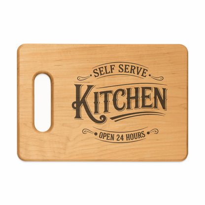 Wooden cutting board with "Self Serve Kitchen Open 24 Hours" text.