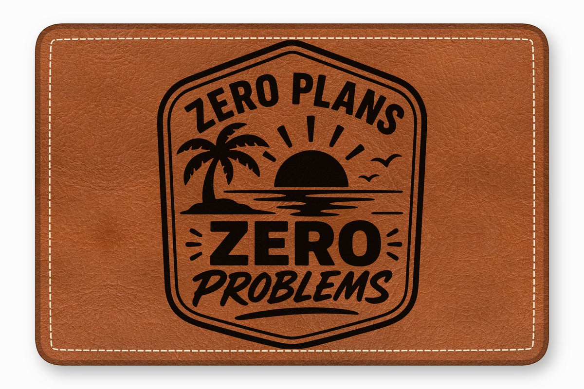 Brown rectangular leather patch embossed with a sunset, palm tree, and text reading ZERO PLANS ZERO PROBLEMS.
