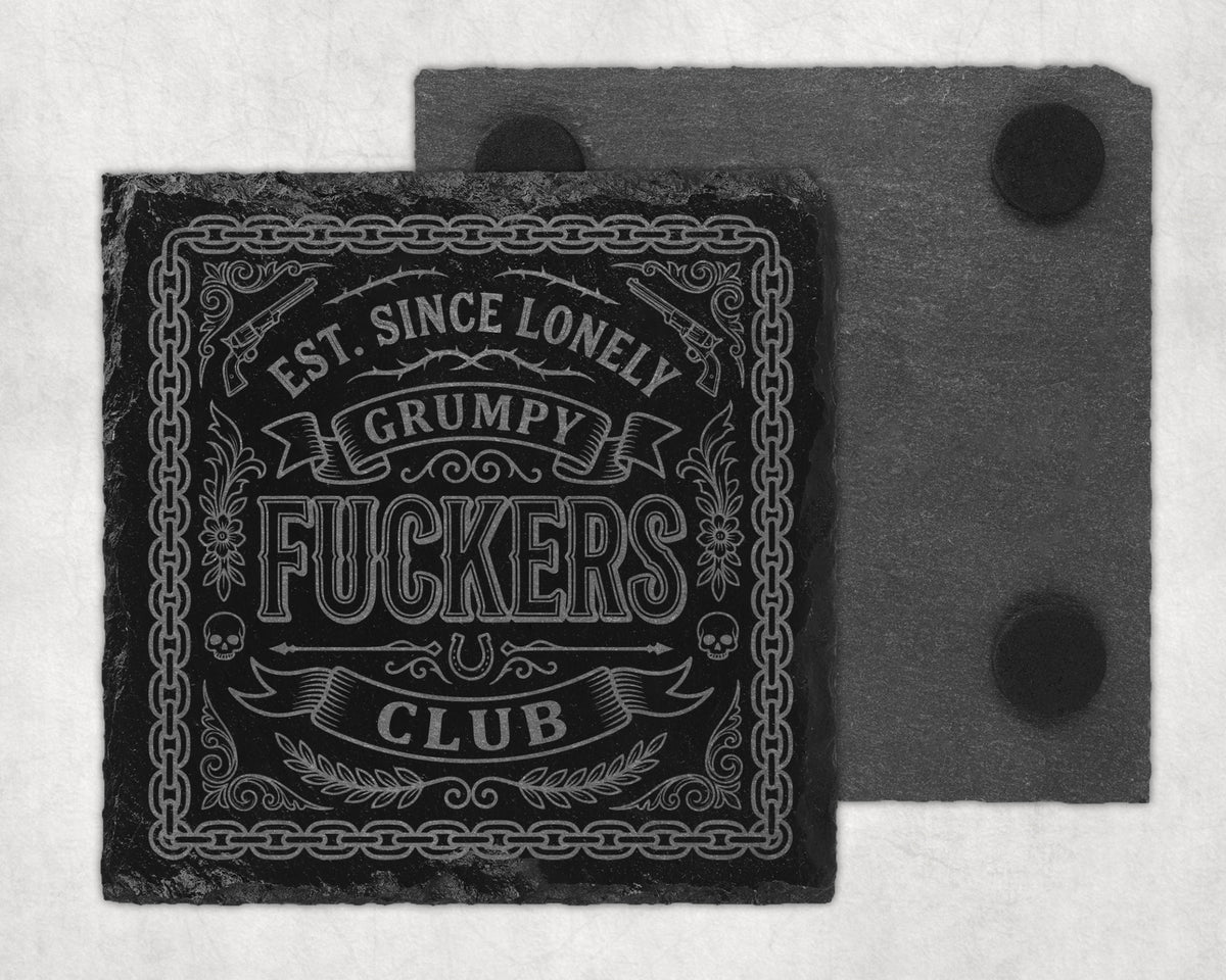 Slate coaster with text "Est. Since Lonely Grumpy Fuckers Club" and decorative elements.