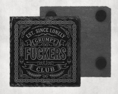 Slate coaster with text "Est. Since Lonely Grumpy Fuckers Club" and decorative elements.