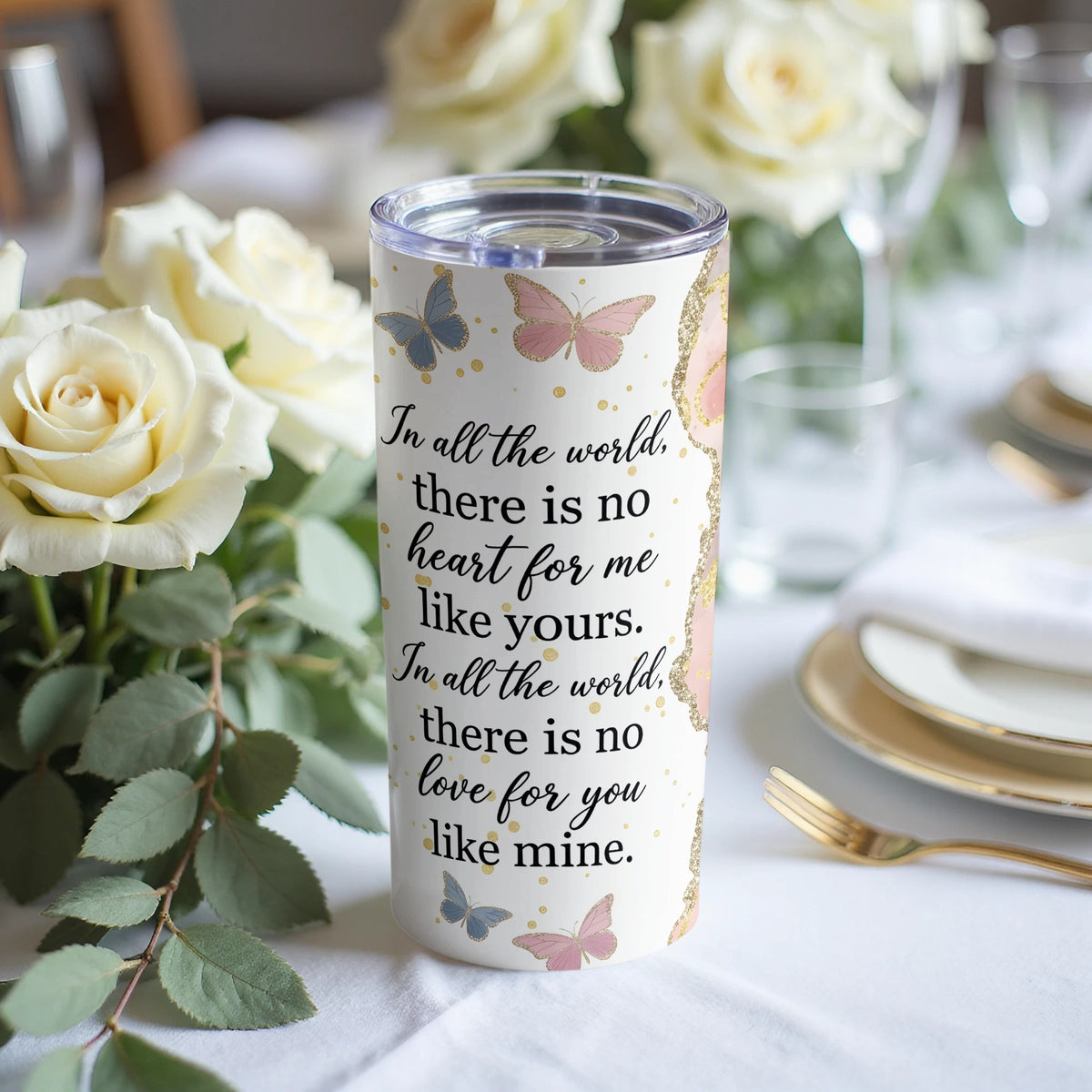 White tumbler with butterflies and the text "In all the world, there is no heart for me like yours."