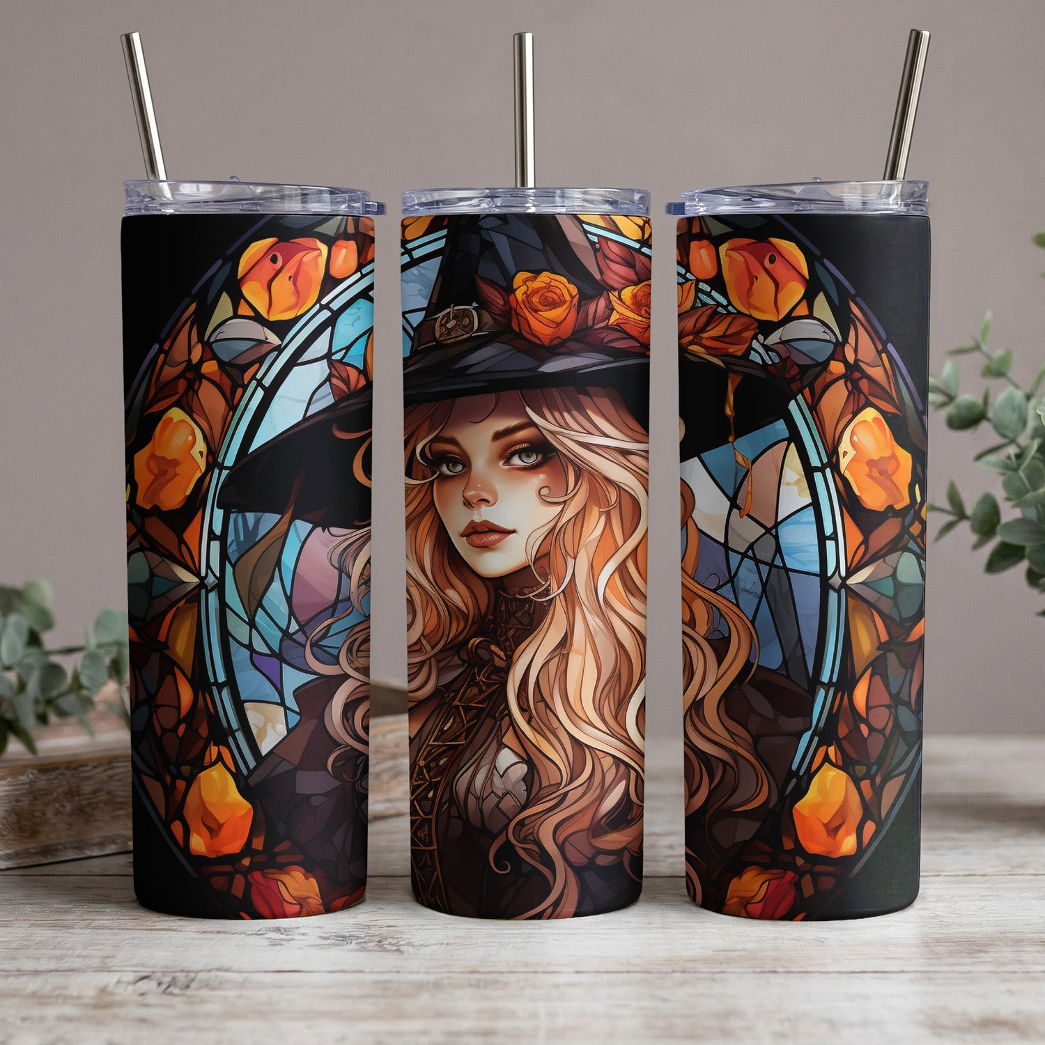 Three tumblers featuring a witch and stained-glass floral design.