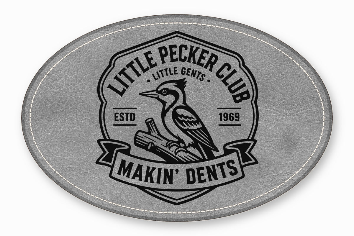 Grey oval faux leather patch featuring a black embroidered emblem of a woodpecker, text, and stitched border.