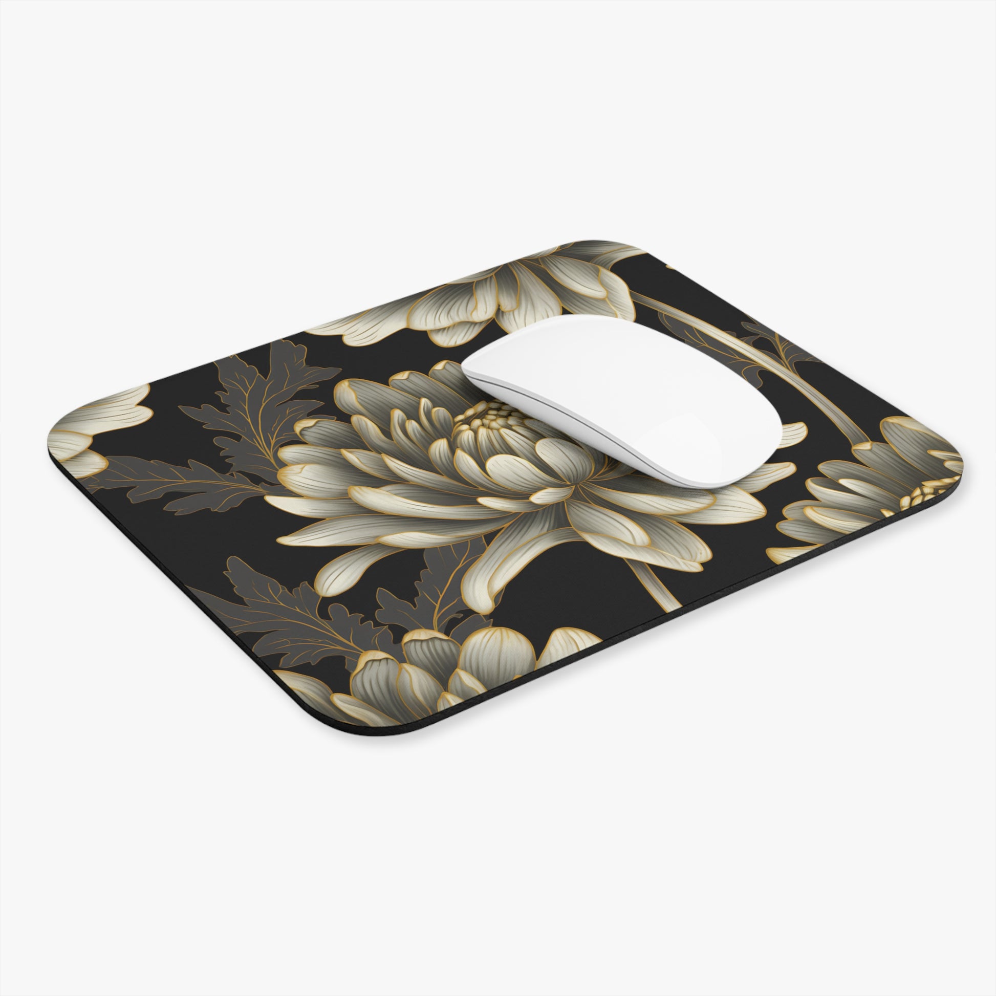 Mousepad with a black background and a detailed floral pattern of white and gold flowers.