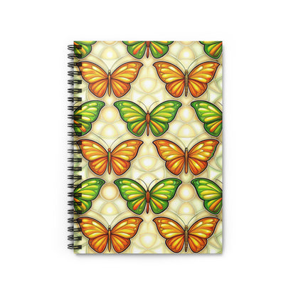 Spiral notebook with orange and green butterfly pattern and a light cream background.