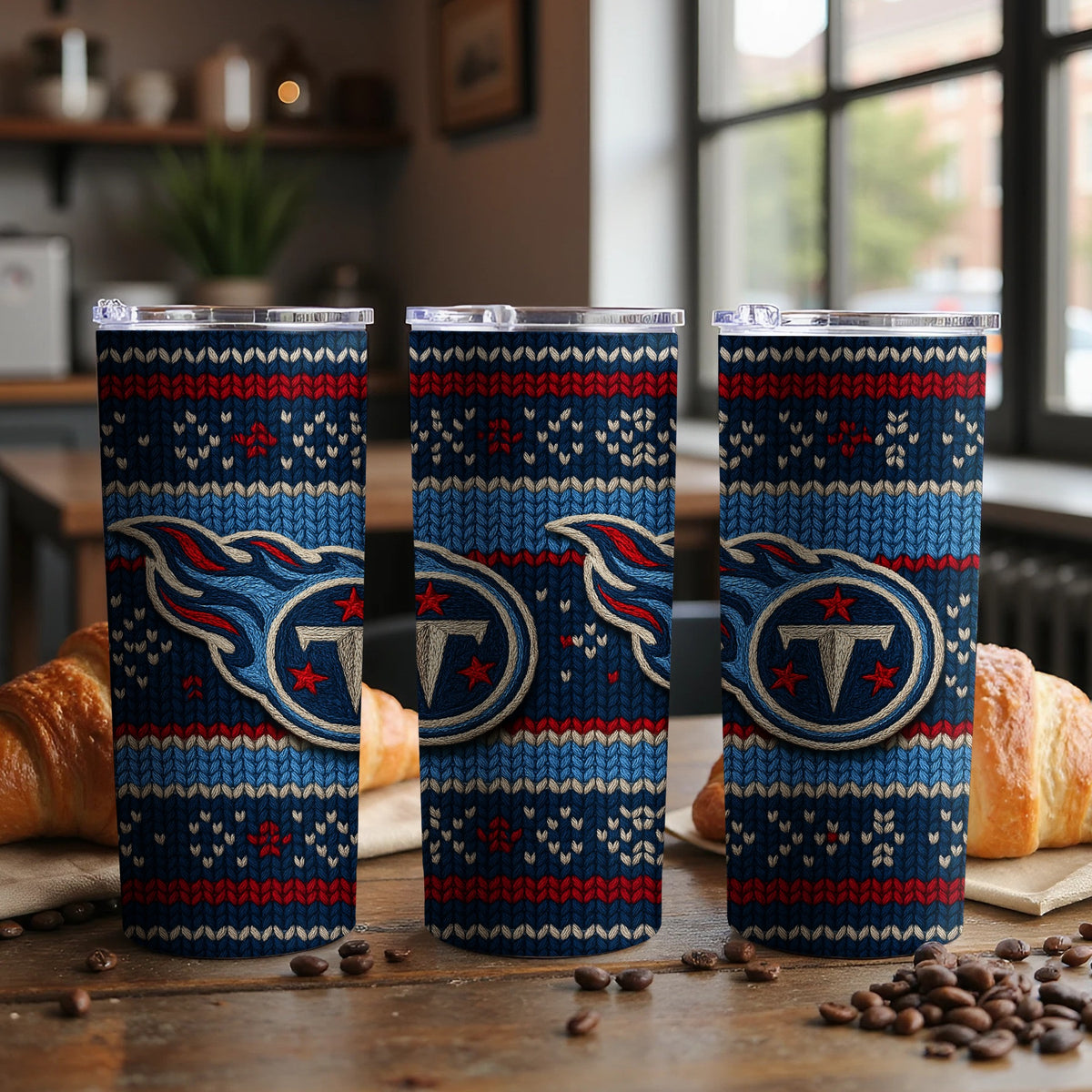 Tennessee Titans ugly sweater pattern tumblers with coffee beans and croissants.