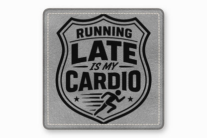 Grey square leather patch with stitched edges, featuring the text Running Late Is My Cardio inside a shield emblem with a running figure.