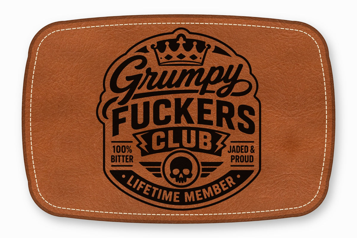 Brown leather rectangular patch with white stitched borders and a black Grumpy Fuckers Club logo.