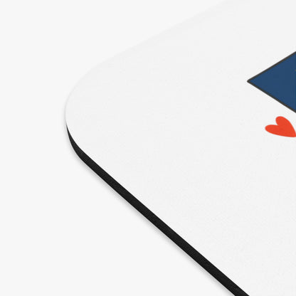Mousepad with blue diamond and red heart graphic.