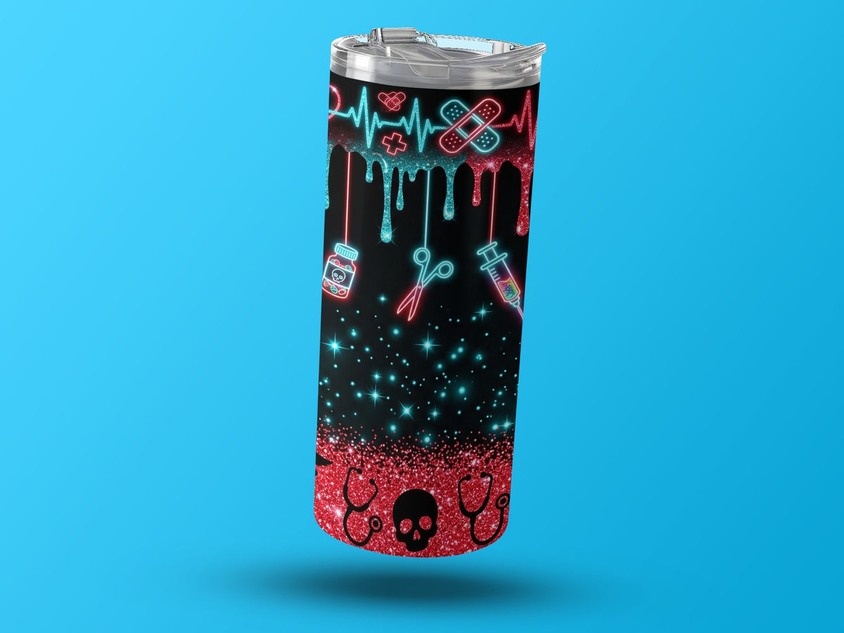 Tumbler with medical icons, glitter, and skull designs on a blue background.