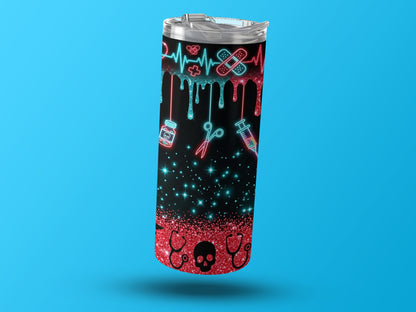 Tumbler with medical icons, glitter, and skull designs on a blue background.