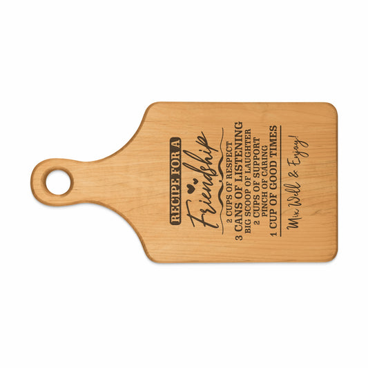 Wooden cutting board with "Recipe for a Friendship" and ingredient list.