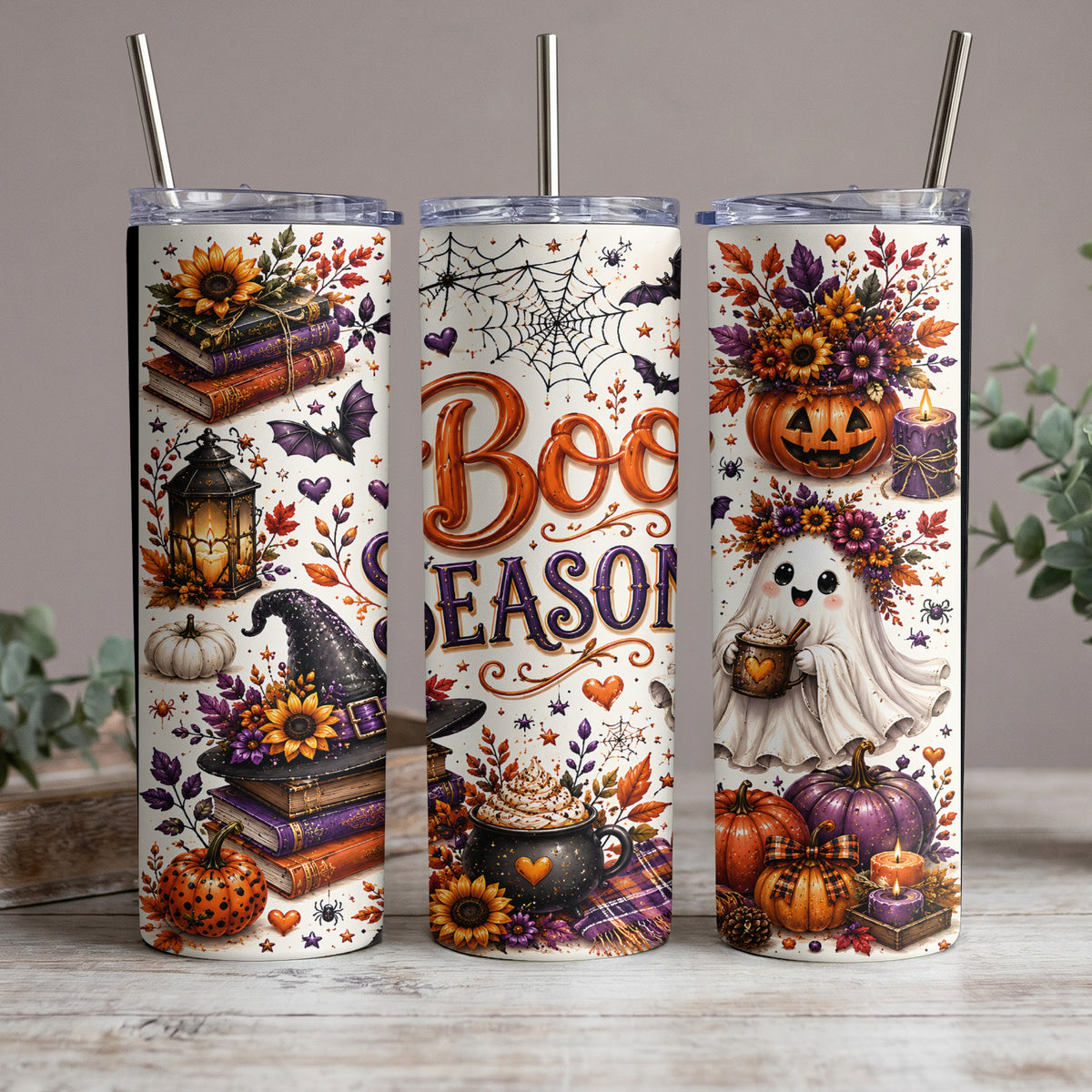 Three Halloween-themed tumblers with ghosts, pumpkins, books, and the text "Boo Season".