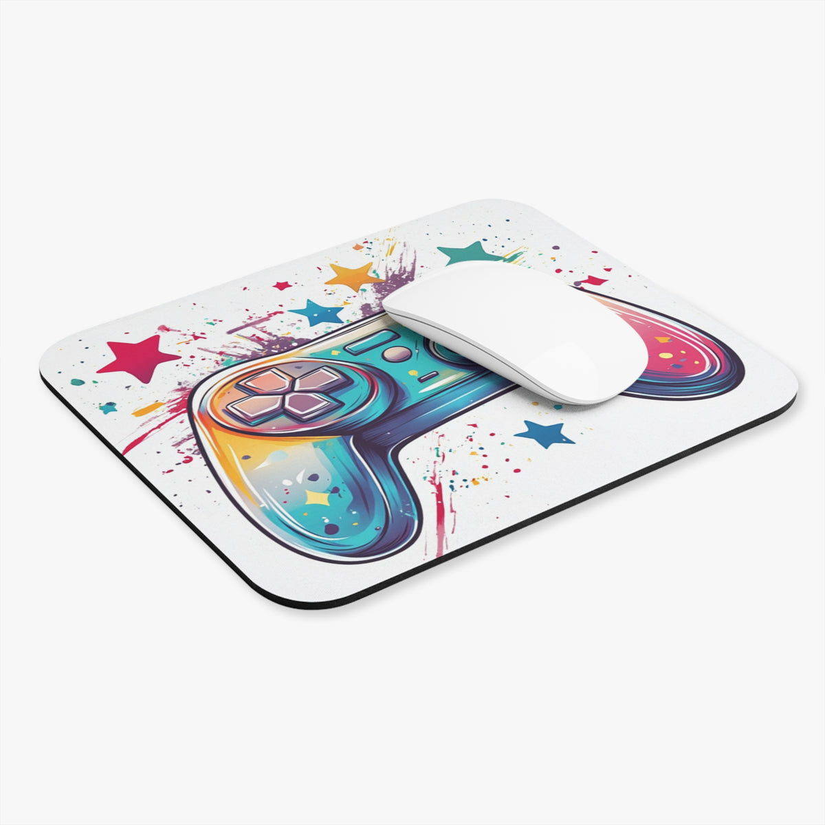 Mousepad with colorful video game controller graphic and scattered stars.