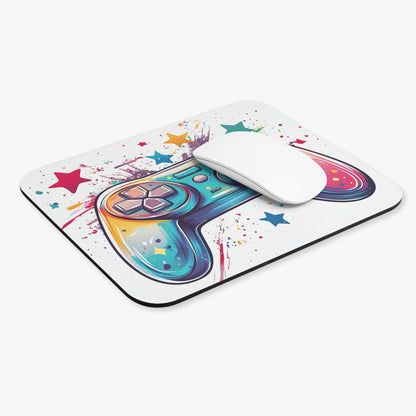 Mousepad with colorful video game controller graphic and scattered stars.