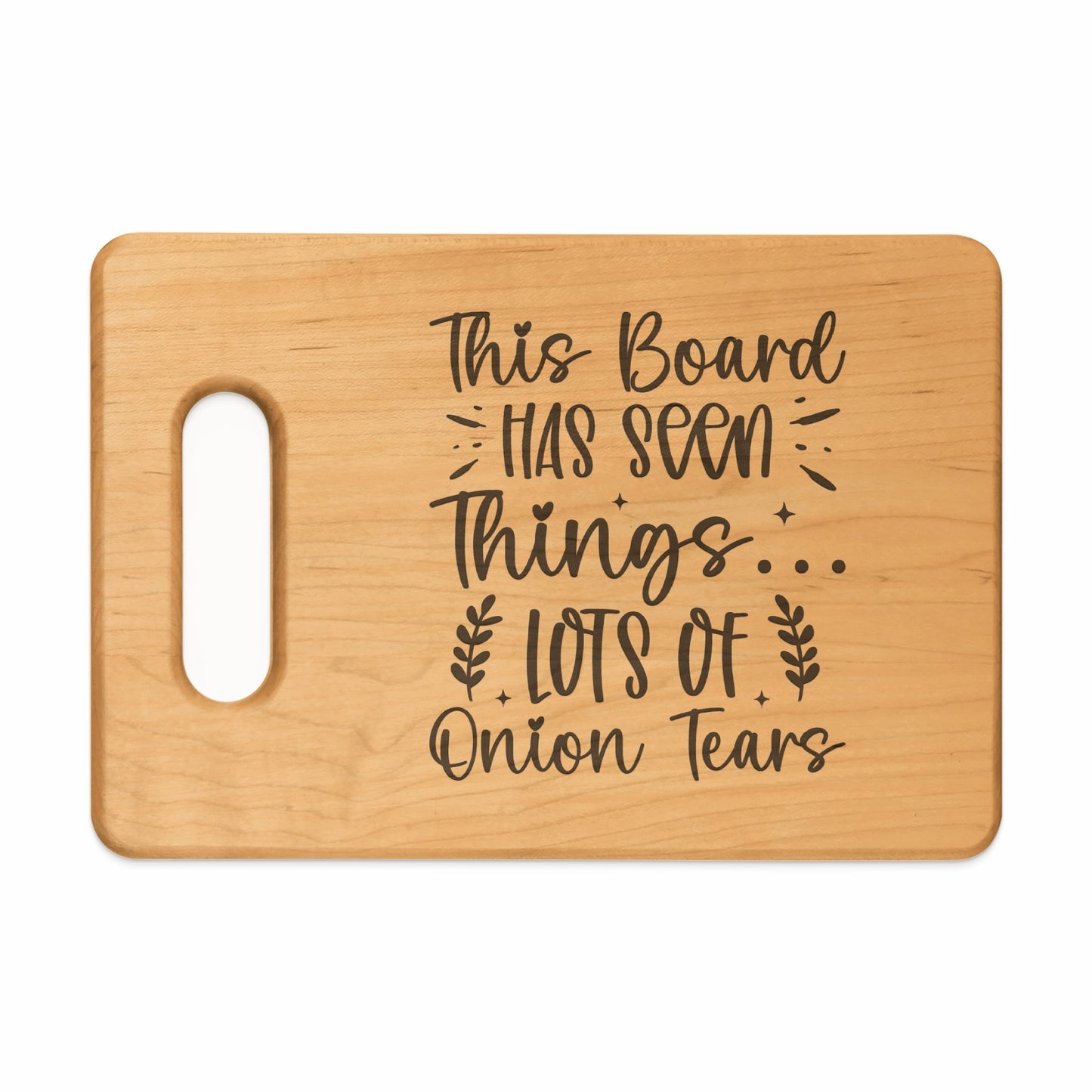 Wooden cutting board with text: "This board has seen things... lots of onion tears."