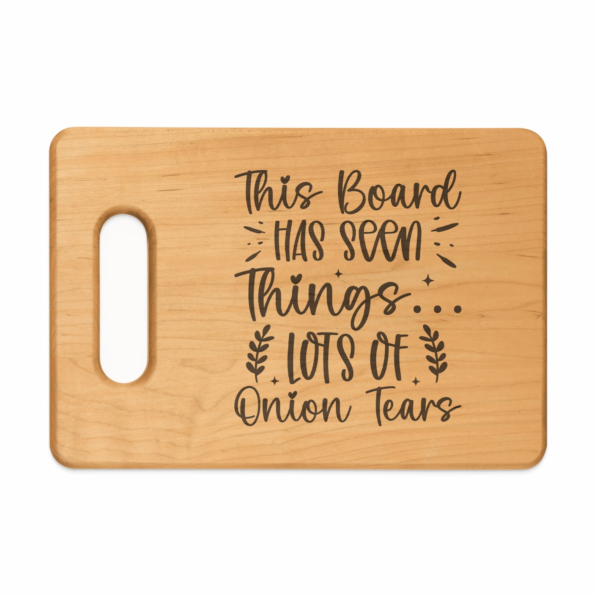 Wooden cutting board with text: "This board has seen things... lots of onion tears."