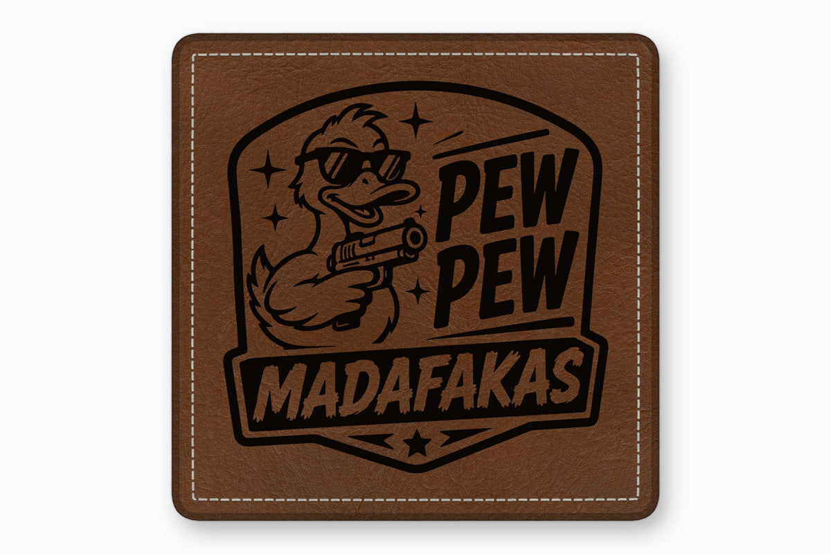 A brown leather square patch features a laser-engraved design of a duck wearing sunglasses and holding a gun, with the text PEW PEW MADAFAKAS.