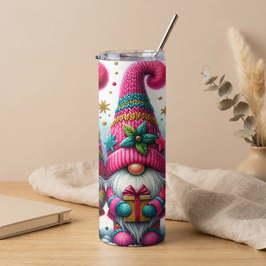 Tumbler featuring a festive gnome holding a gift with a metallic straw.
