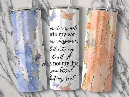 Three tumblers with marble and gold designs, one with quote and butterflies.