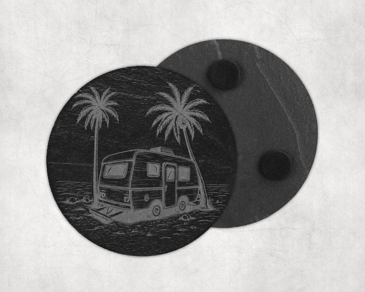 Round slate coaster etched with a vintage camper and palm trees on a beach.