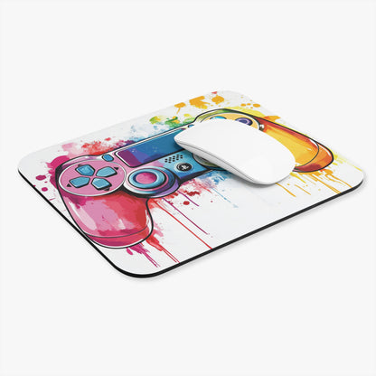 Mousepad with a watercolor-style video game controller design and a white mouse.