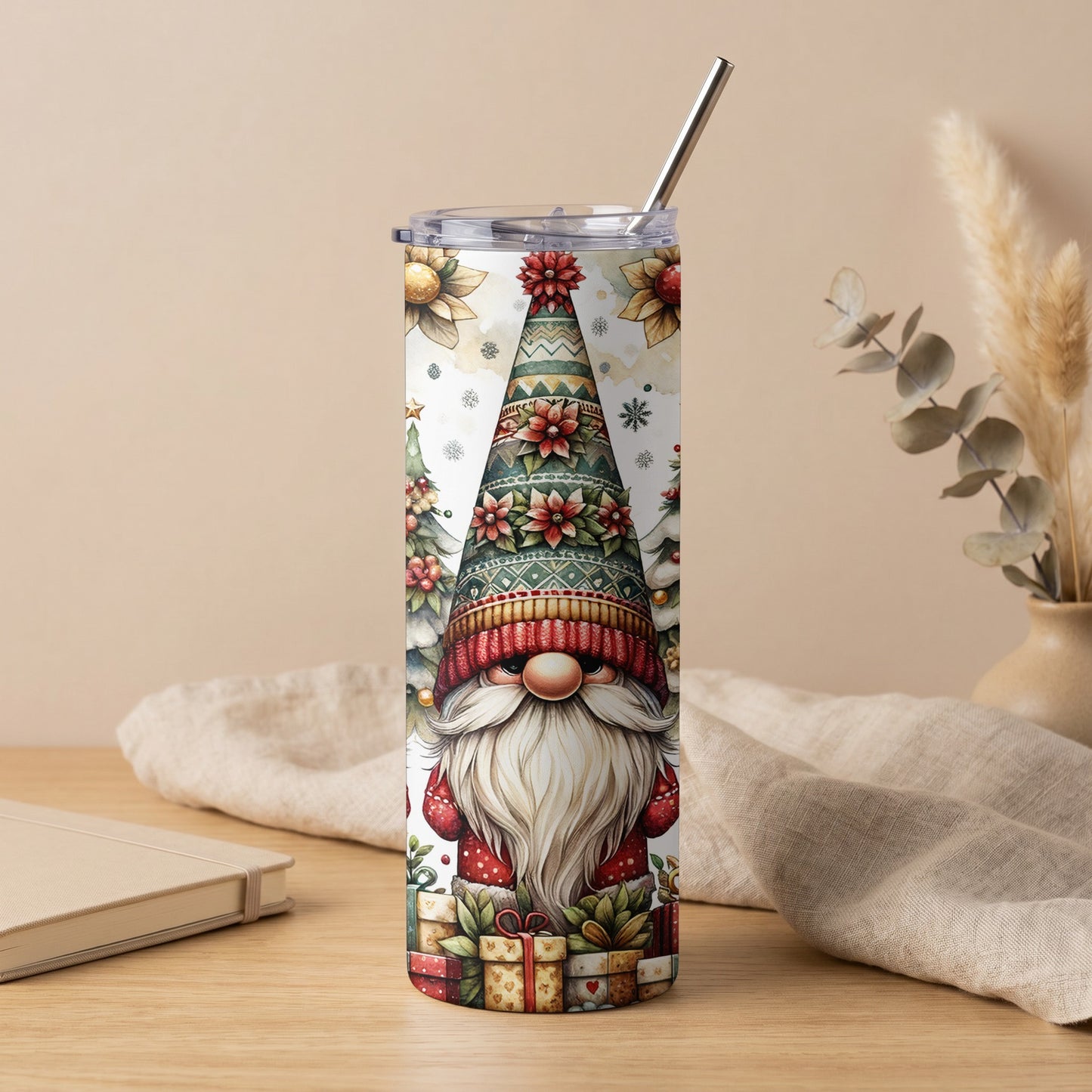 Tumbler with a watercolor gnome, Christmas trees, and gifts.