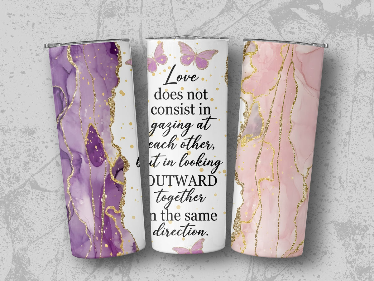 Tumblers with marble-like purple and pink designs, gold accents, and quote.