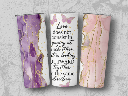 Tumblers with marble-like purple and pink designs, gold accents, and quote.