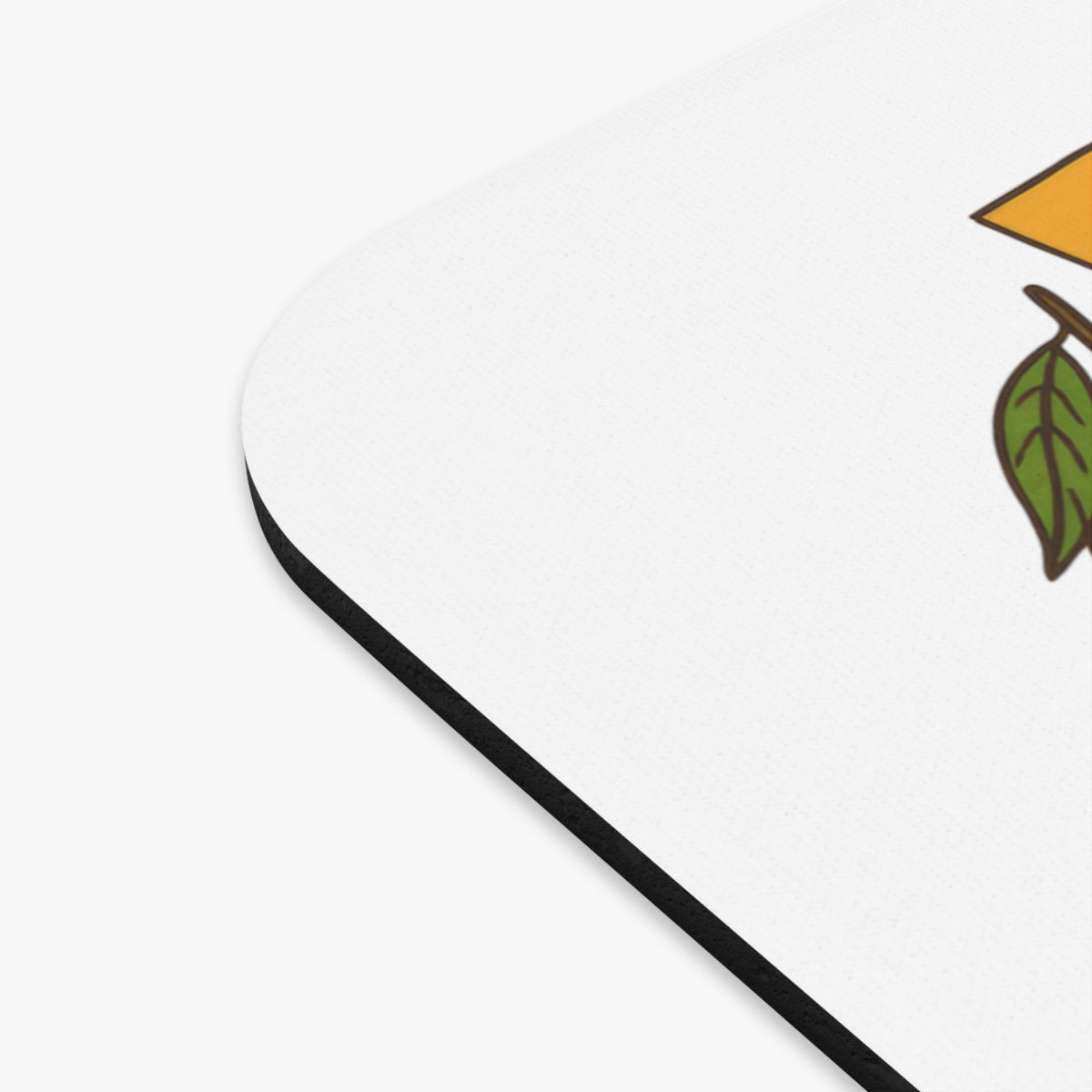 Mousepad with a cartoon orange slice and a leaf on a white background.