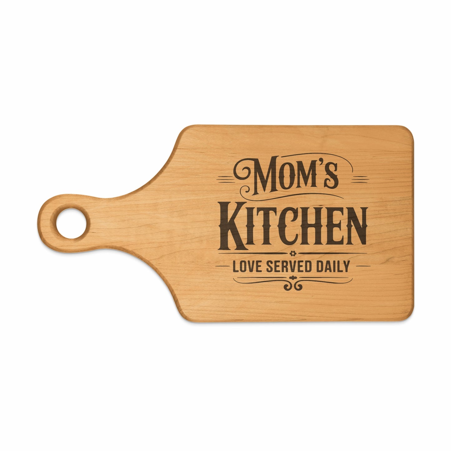 Wooden cutting board with text "Mom's Kitchen, Love Served Daily".